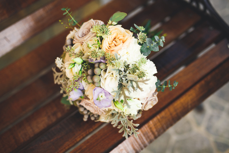 Beautiful wedding bouquet with different flowers, rosesの写真素材