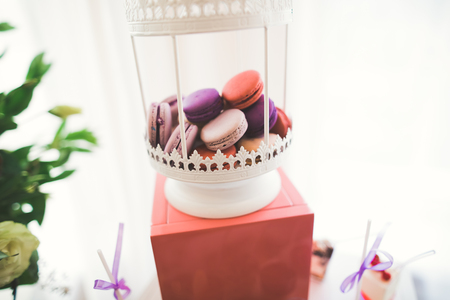 Delicious sweets on wedding candy buffet with desserts, cupcakesの写真素材