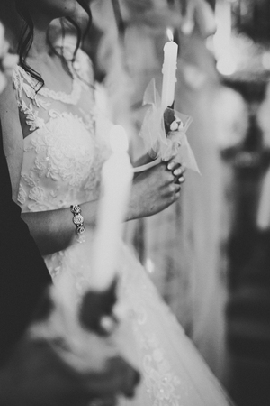 Wedding couple bide and groom get married in a church.の写真素材
