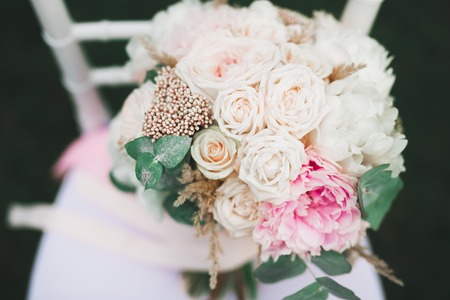 Beautiful wedding bouquet with different flowers, rosesの写真素材
