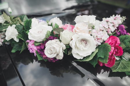 Wedding car decorated with beautiful, luxury flowersの写真素材