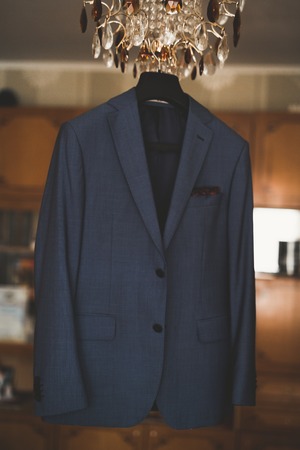Stylish groom suit in dressing room indoorsの写真素材