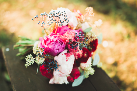 Beautiful wedding bouquet with different flowers, rosesの写真素材