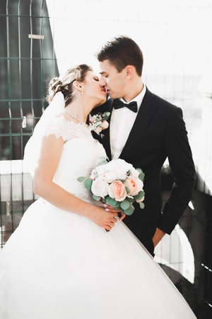 Sensual portrait of a young wedding couple. Outdoorの写真素材