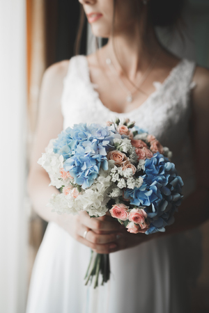 Beautiful luxury bride in elegant white dressの写真素材
