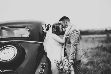 Caucasian happy romantic young couple celebrating their marriage. Outdoorの写真素材