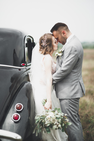 Caucasian happy romantic young couple celebrating their marriage. Outdoorの写真素材