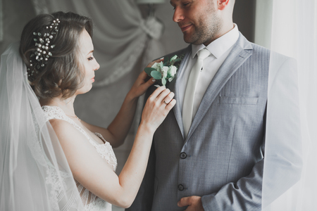 Lovely happy wedding couple, bride with long white dress