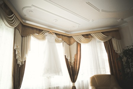 The perfect wedding dress in the room of the bride.の写真素材