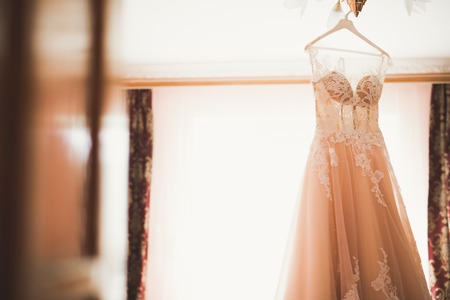 The perfect wedding dress in the room of the brideの写真素材