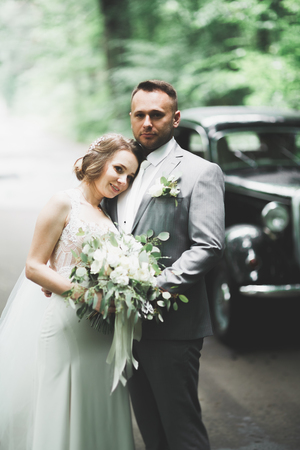 Caucasian happy romantic young couple celebrating their marriage. Outdoorの写真素材