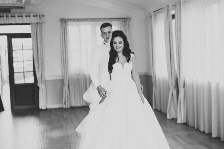 Beautiful wedding couple just married and dancing their first danceの写真素材