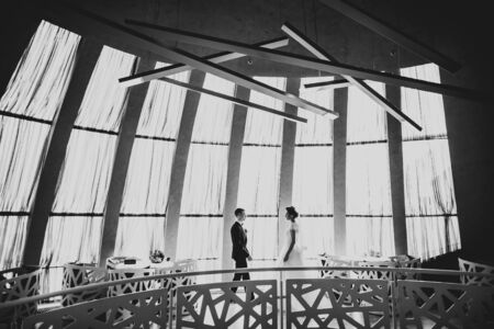Young happy couple walking to meet each otherの写真素材
