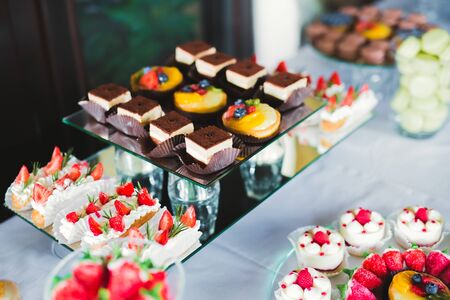 Buffet with a variety of delicious sweets, food ideas, celebrationの写真素材