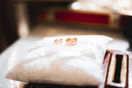 Wedding rings on ceremony at church. Macro.の写真素材