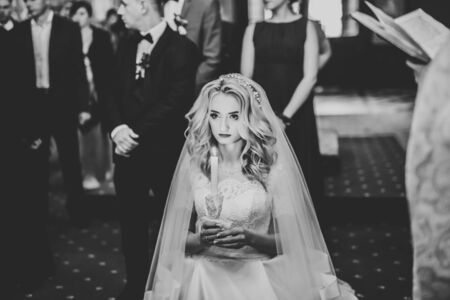 Wedding couple bide and groom get married in a church