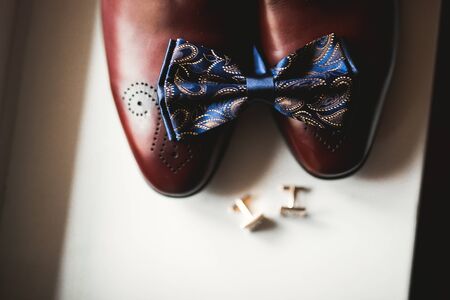 Men's accessories with luxury shoes. Top view.