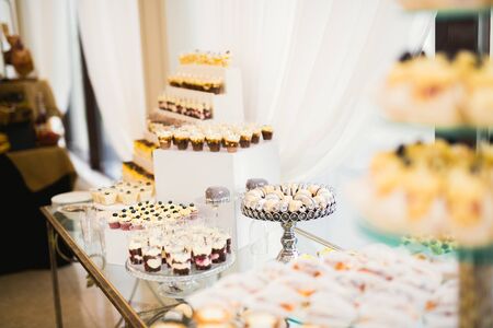 Buffet with a variety of delicious sweets, food ideas, celebration.の写真素材