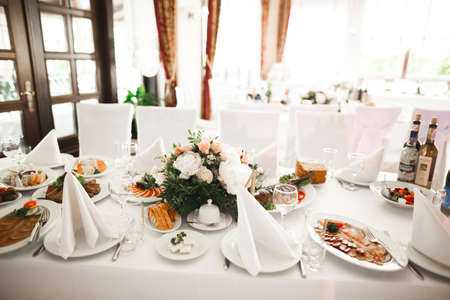 Interior of a restaurant prepared for wedding ceremonyの写真素材
