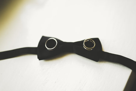 Two golden wedding rings isolated background conceptの写真素材