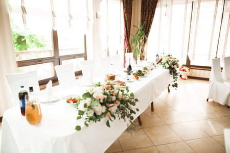 Interior of a restaurant prepared for wedding ceremonyの写真素材