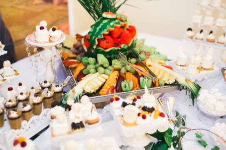 Delicious wedding reception candy bar dessert tableの写真素材