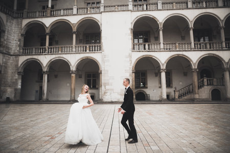 Caucasian happy romantic young couple celebrating their marriage. Outdoorの写真素材