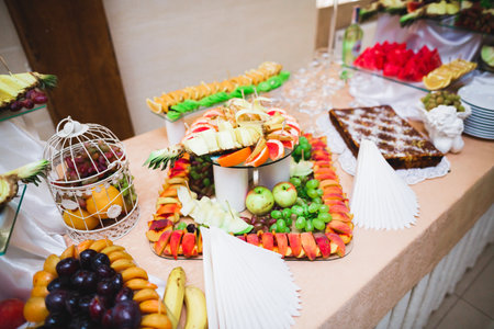 Buffet with a variety of delicious sweets, food ideas, celebrationの写真素材