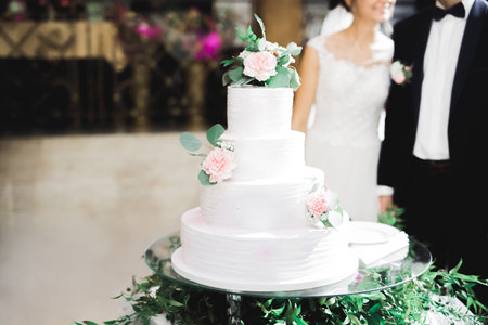 Luxury decorated wedding cake on the tableの写真素材