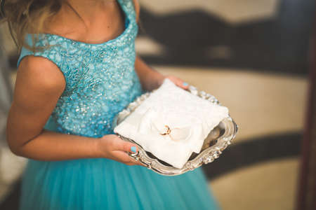 Wedding rings on ceremony at church. Macro.