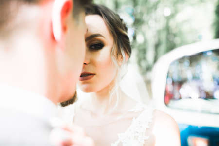 Sensual portrait of a young wedding couple. Outdoorの写真素材
