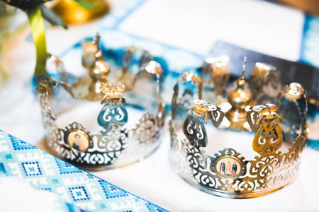 Golden crowns lying on the table in church