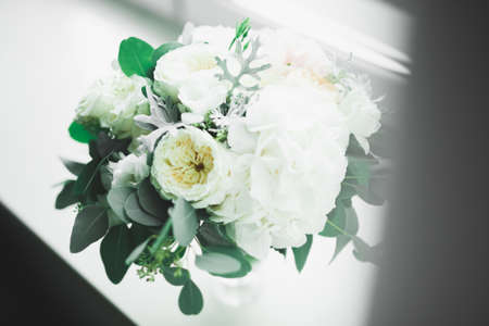 Beautiful wedding bouquet with different flowers, rosesの写真素材