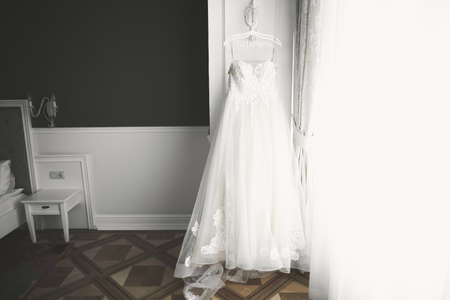 The perfect wedding dress in the room of the brideの写真素材