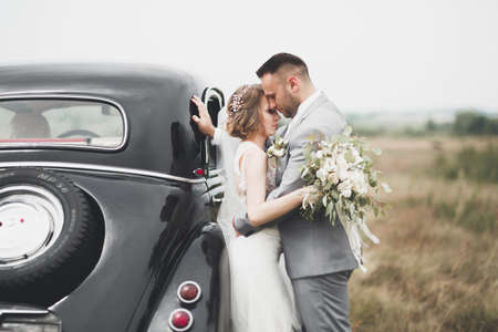 Caucasian happy romantic young couple celebrating their marriage. Outdoorの写真素材