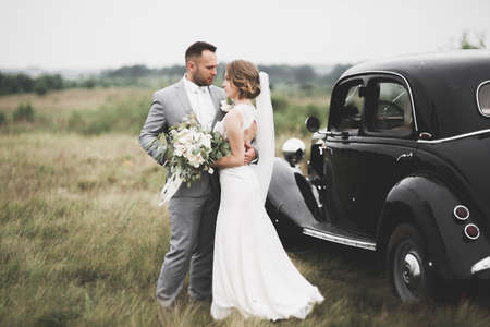 Caucasian happy romantic young couple celebrating their marriage. Outdoorの写真素材