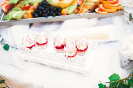Delicious wedding reception candy bar dessert tableの写真素材