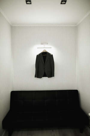 Stylish groom suit in dressing room indoorsの写真素材