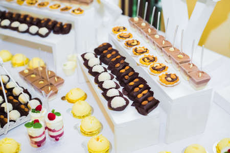 Delicious wedding reception candy bar dessert tableの写真素材