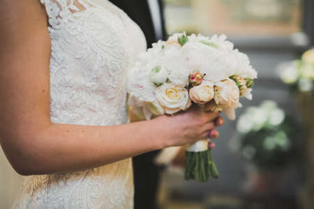 Wedding couple bide and groom get married in a churchの写真素材