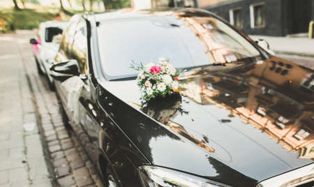 Wedding car decorated with beautiful, luxury flowersの写真素材