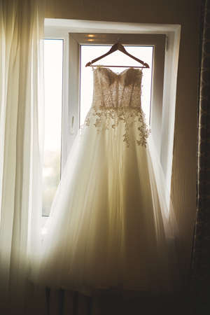 The perfect wedding dress in the room of the brideの写真素材