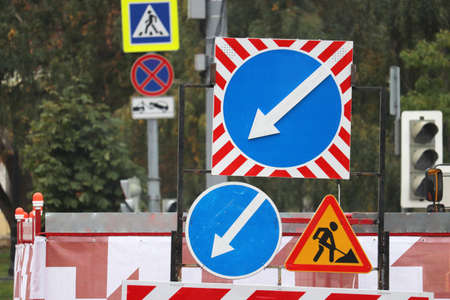 Road work and construction, road signs on the city street
