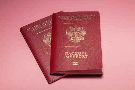 Two foreign passports Russia on a pink backgroundの写真素材