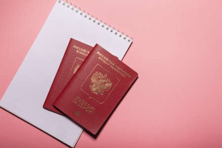 Two foreign passports Russia on a pink backgroundの写真素材