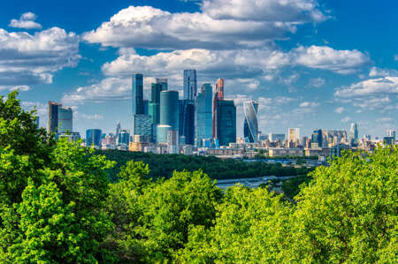 Large panoramic view of Moscow city buildings, a modern business center on the banks of the Moscow river on a bright Sunny day. The view of Moscow state University. Moscow, Russia-June 2019の写真素材
