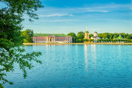 Kuskovsky Park, pond and Kuskovsky Palace at sunset. The estate of the Sheremetev family was built in 1769-1775. The Museum in Kuskovo. Moscow, Russia-June 2019のeditorial素材