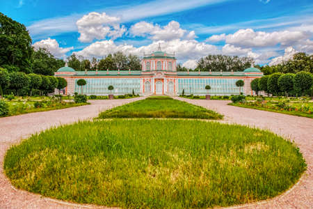 Kuskovo Manor. Greenhouse complex in Kuskovo Park on a Sunny summer day, the estate of count Sheremetev. Architectural and artistic ensemble of the XVIII century. A popular attraction in Moscow. Moscow-June 2020のeditorial素材