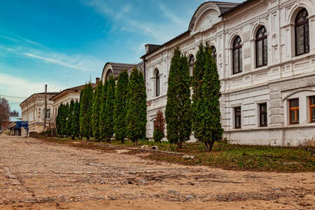 Cobblestone streets of the ancient Russian merchant town of Kalyazin in late autumn on a Sunny day. Kalyazin, Tver region, Russiaのeditorial素材