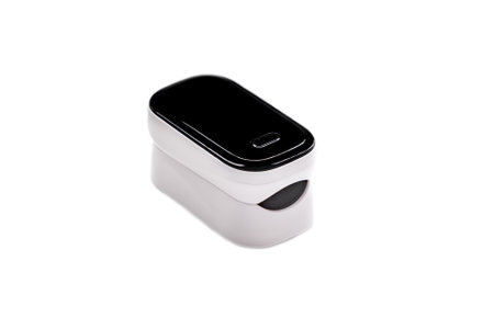 Pulse oximeter / peripheral capillary oxygen saturation meter (SPO2) for assessing the amount of oxygen in the blood isolated on a white backgroundの写真素材